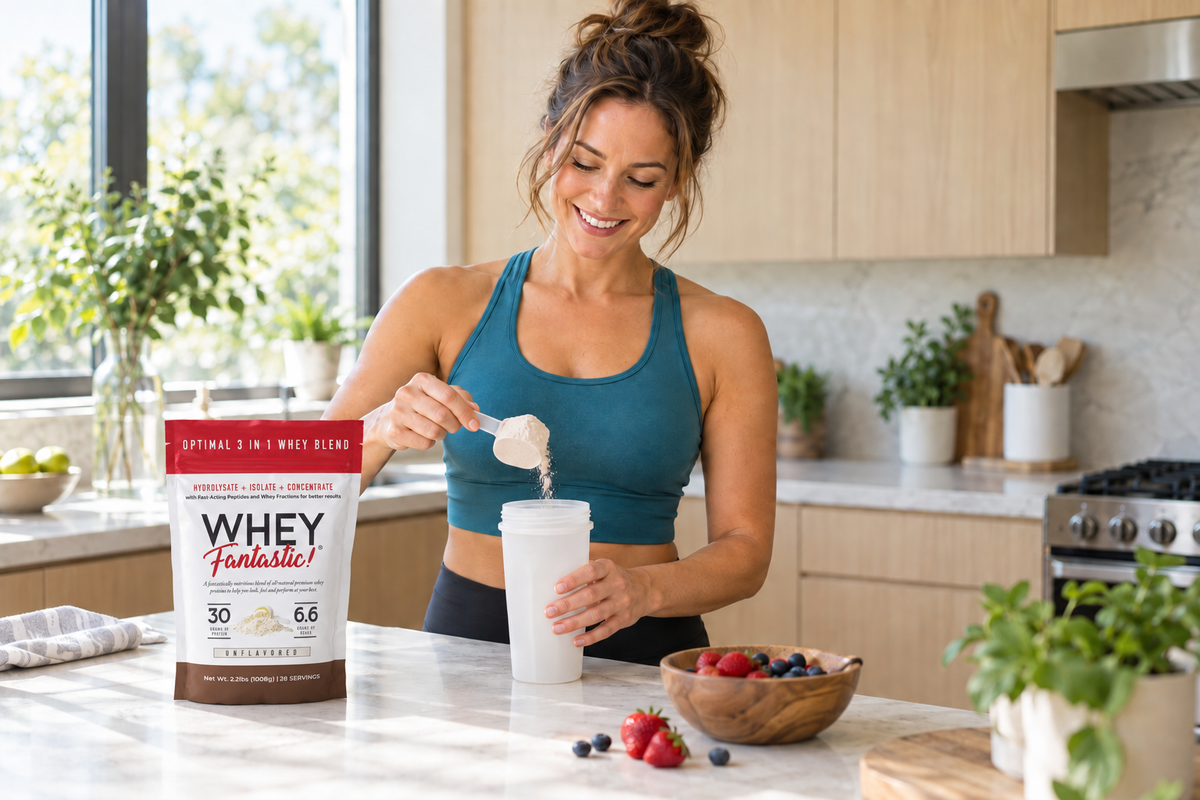 Woman preparing a protein shake in a bright kitchen